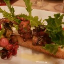 Poulpe en persillade sur une focaccia, crème de céleri Citrus